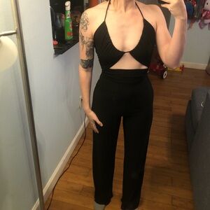 Black jumpsuit with cut out detail